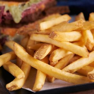 Stealth 3/8″ Regular Cut Skin-On French Fries | Styled